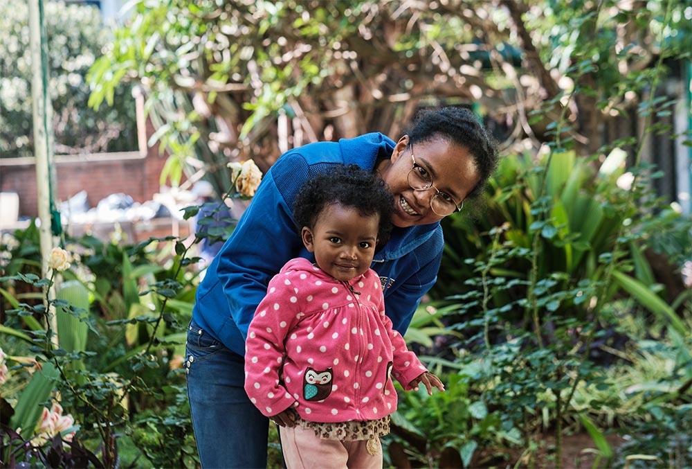 Tsiorihasina smiling with her mother after cleft surgery