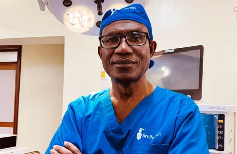 Dr Georges Ntakiyiruta posing with arms folded before surgery