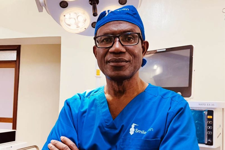 Dr Georges Ntakiyiruta posing with arms folded before surgery