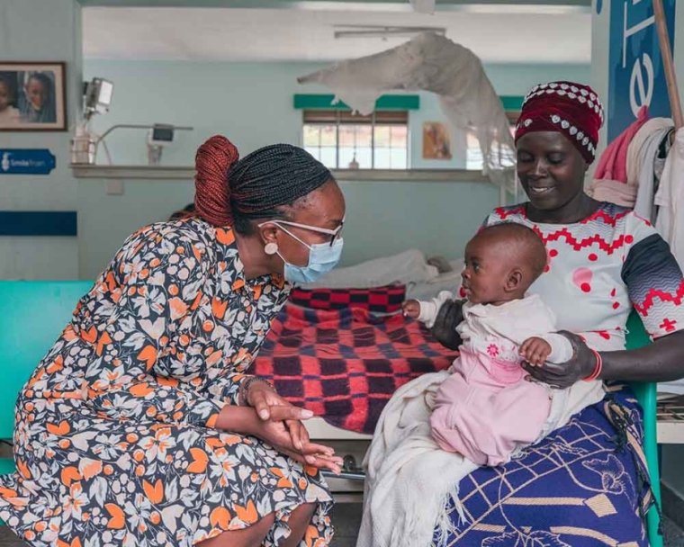 Dr. Elizabeth Igaga meeting with a cleft-affected patient